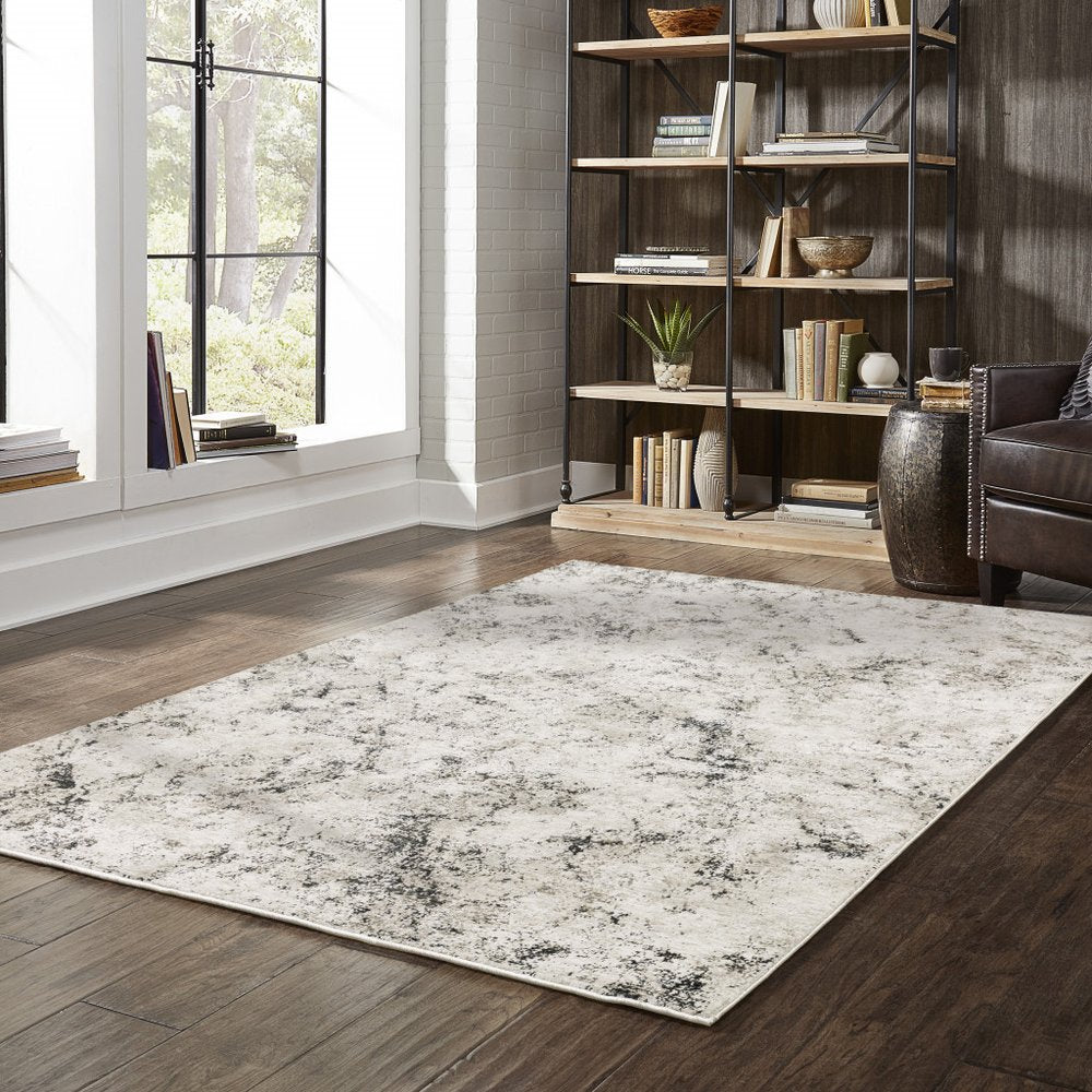 8' X 11' Ivory And Gray Abstract Area Rug