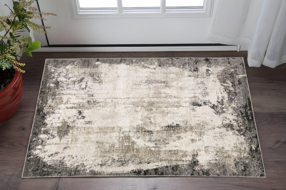 2' X 8' Grey Ivory Charcoal Tan Black And Beige Abstract Power Loom Stain Resistant Runner Rug