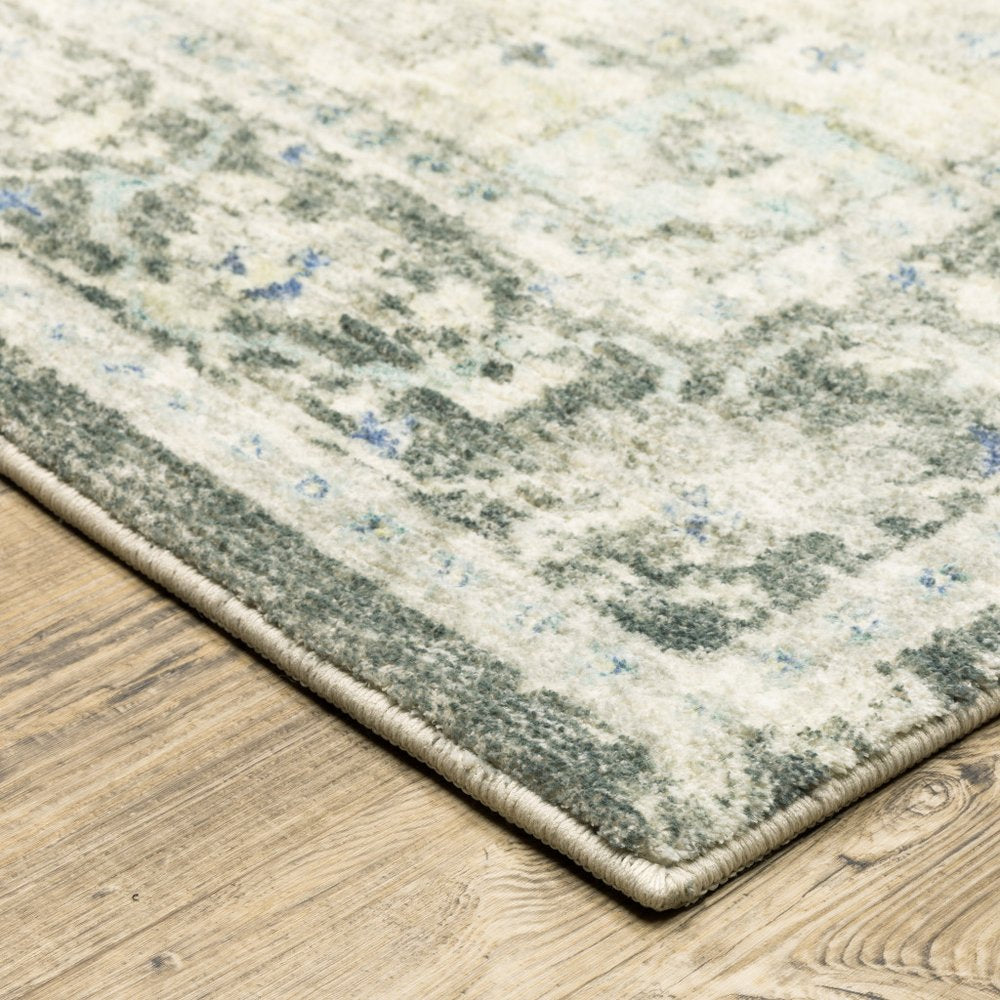8' X 10' Grey Ivory And Blue Oriental Power Loom Stain Resistant Area Rug