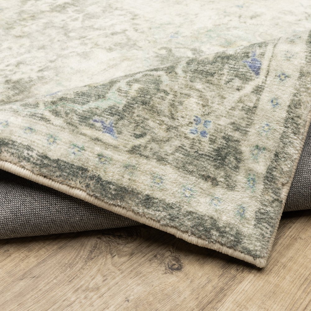 8' X 10' Grey Ivory And Blue Oriental Power Loom Stain Resistant Area Rug