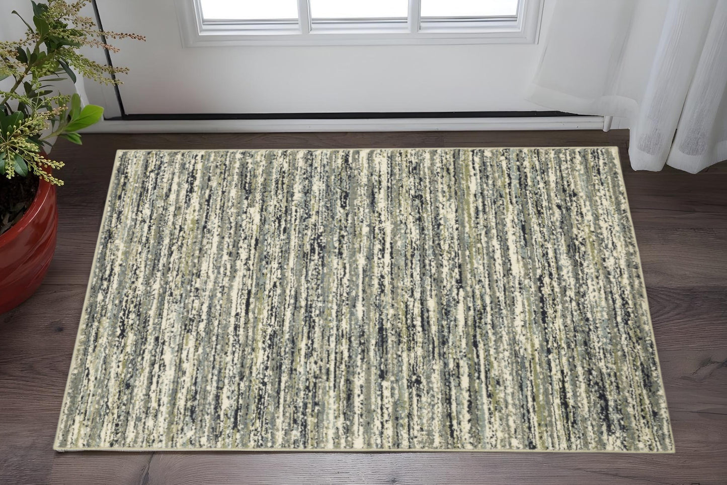 10' X 13' Blue Green Light Blue Grey And Ivory Abstract Power Loom Stain Resistant Area Rug
