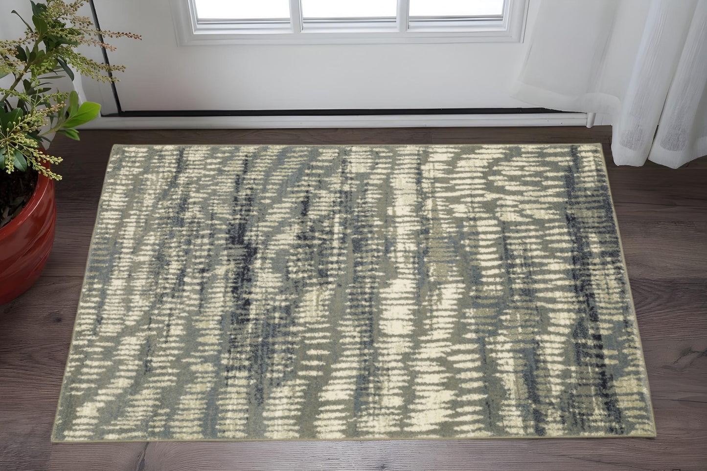 10' X 13' Grey Beige Blue And Light Blue Abstract Power Loom Stain Resistant Area Rug