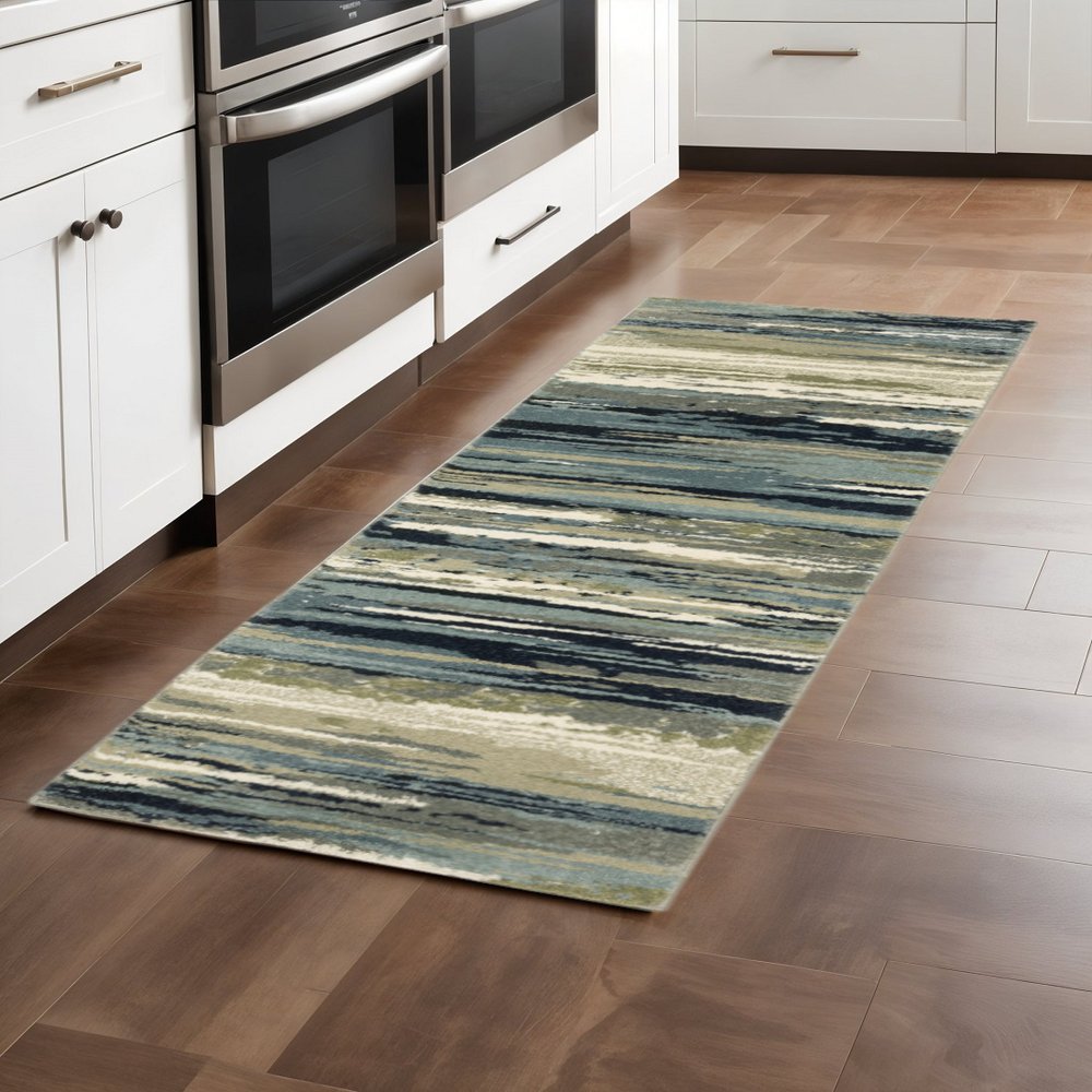 10' X 13' Blue Green Grey Light Blue And Beige Abstract Power Loom Stain Resistant Area Rug