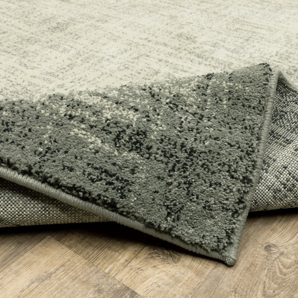 10' X 13' Grey Beige And Blue Power Loom Stain Resistant Area Rug