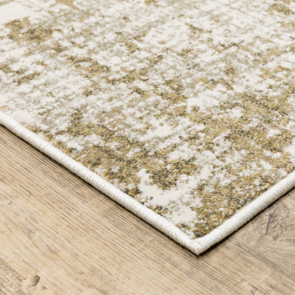 7' X 9' Beige And Ivory Abstract Area Rug