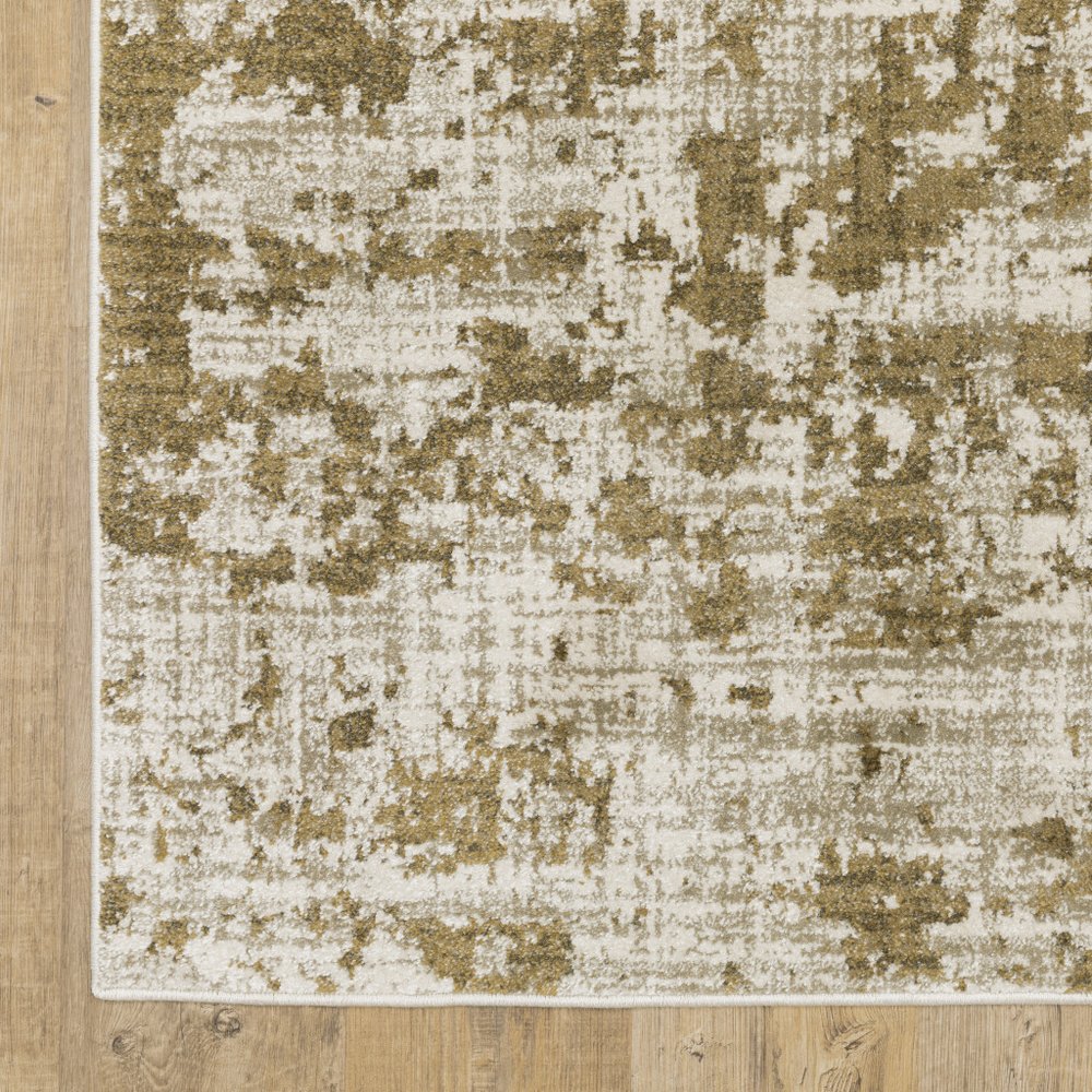7' X 9' Beige And Ivory Abstract Area Rug