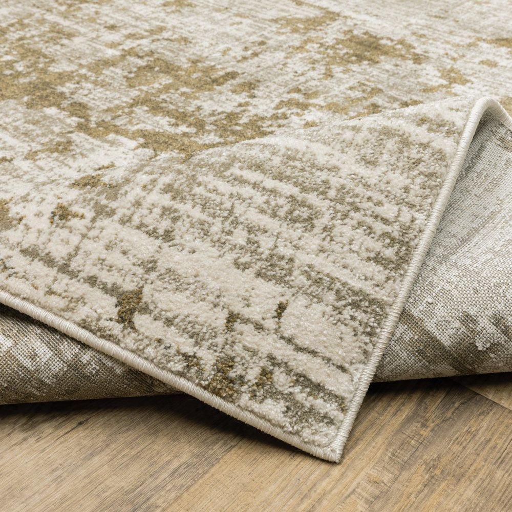 7' X 9' Beige And Ivory Abstract Area Rug