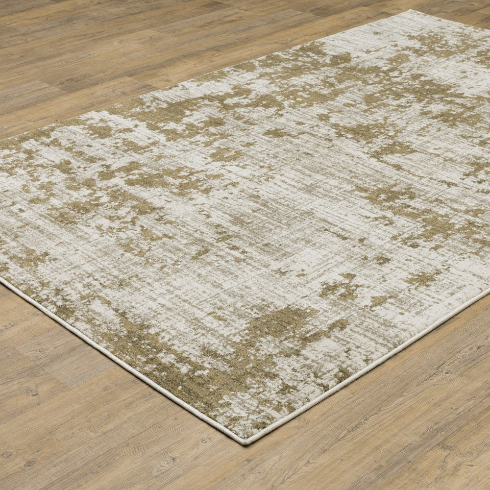 7' X 9' Beige And Ivory Abstract Area Rug