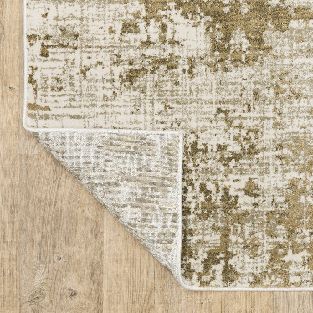 7' X 9' Beige And Ivory Abstract Area Rug