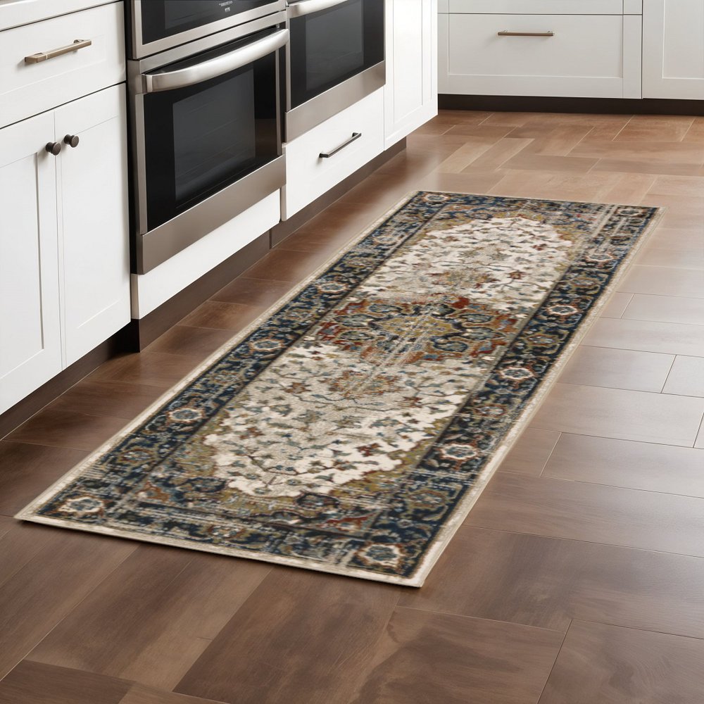 2' X 8' Beige Blue Green Rust And Grey Oriental Power Loom Stain Resistant Runner Rug