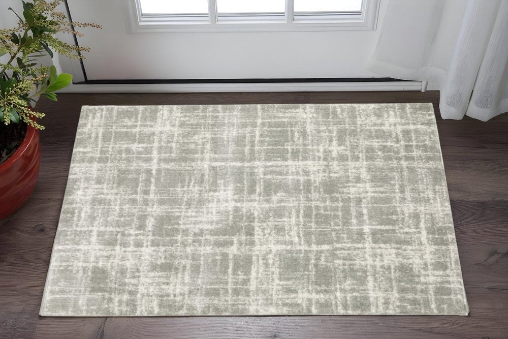 2' X 8' Grey And Ivory Abstract Shag Power Loom Stain Resistant Runner Rug