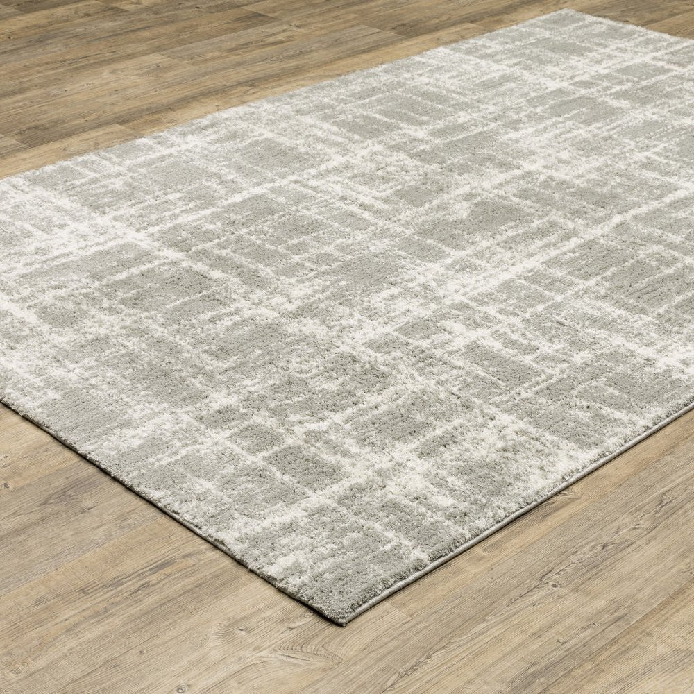 2' X 8' Grey And Ivory Abstract Shag Power Loom Stain Resistant Runner Rug