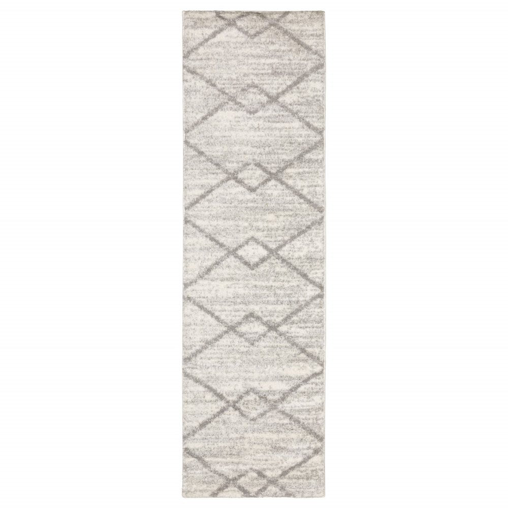 5' X 8' Ivory And Grey Geometric Shag Power Loom Stain Resistant Area Rug