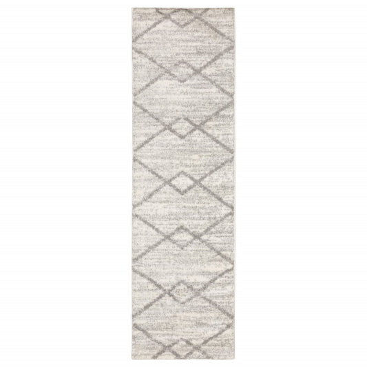 5' X 8' Ivory And Grey Geometric Shag Power Loom Stain Resistant Area Rug