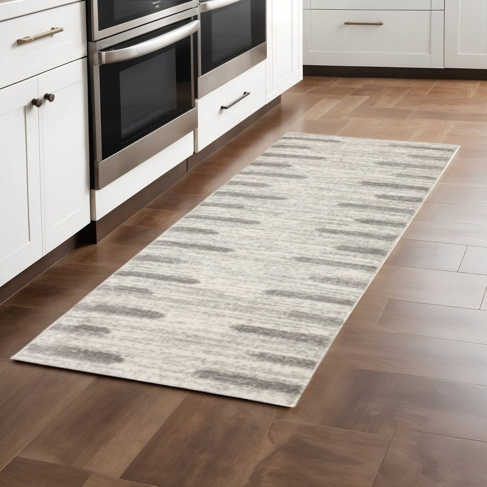 4' X 6' Ivory And Grey Geometric Shag Power Loom Stain Resistant Area Rug