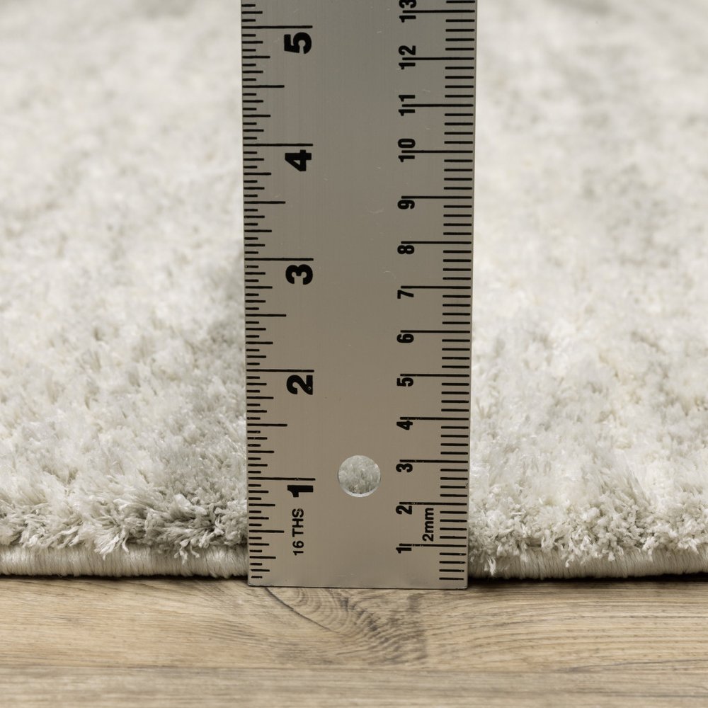 4' X 6' Ivory And Grey Geometric Shag Power Loom Stain Resistant Area Rug