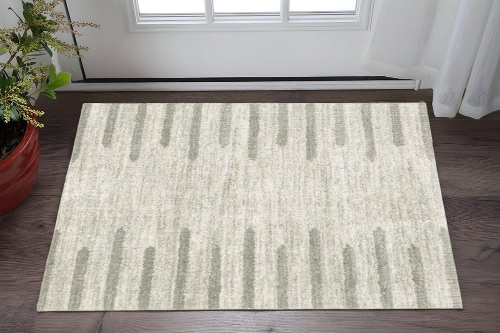 4' X 6' Ivory And Grey Geometric Shag Power Loom Stain Resistant Area Rug