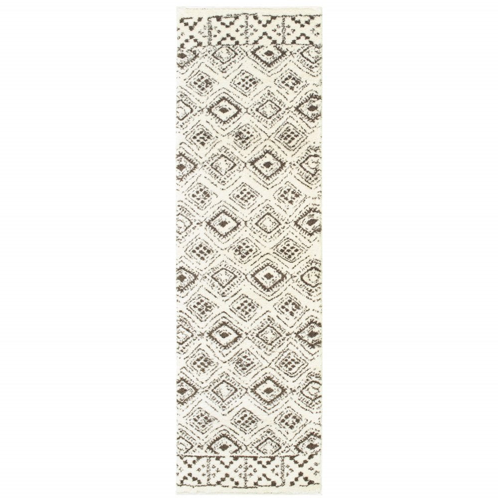 4' X 6' Ivory And Brown Geometric Shag Power Loom Stain Resistant Area Rug