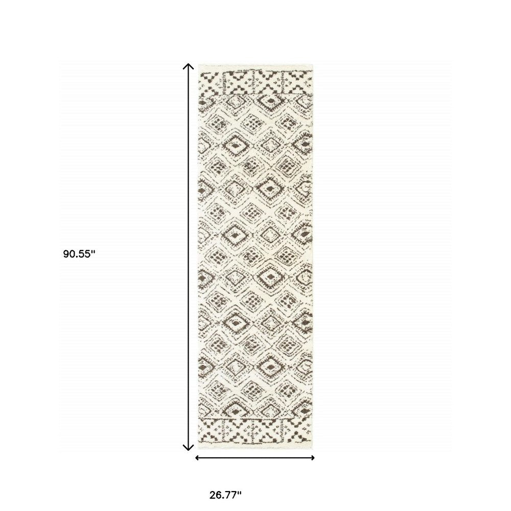 4' X 6' Ivory And Brown Geometric Shag Power Loom Stain Resistant Area Rug