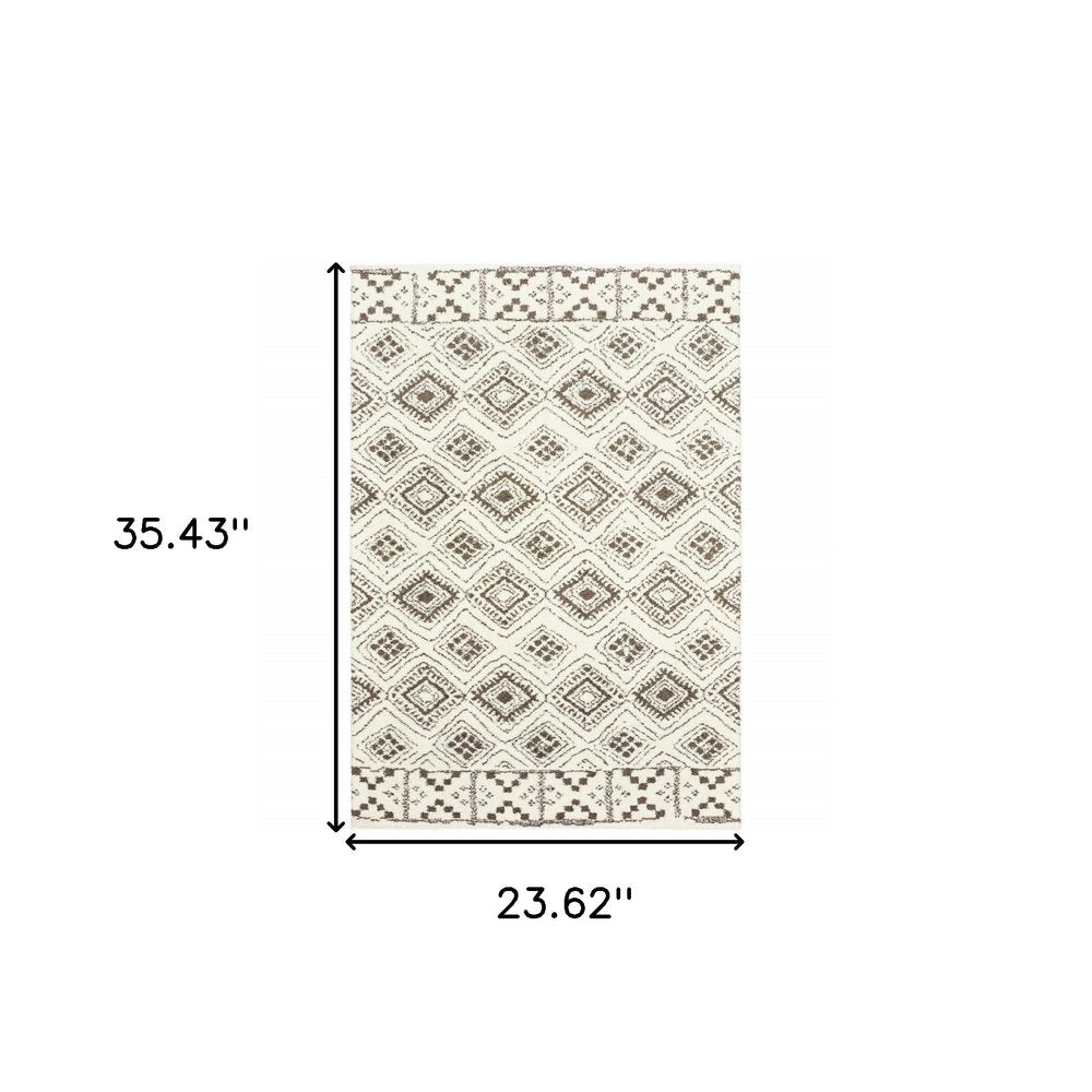 4' X 6' Ivory And Brown Geometric Shag Power Loom Stain Resistant Area Rug