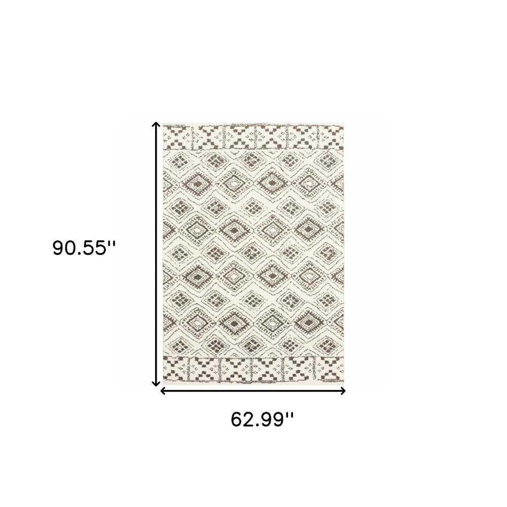 4' X 6' Ivory And Brown Geometric Shag Power Loom Stain Resistant Area Rug