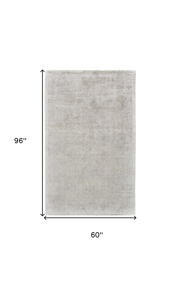 5' X 8' Gray and Ivory Abstract Hand Woven Area Rug