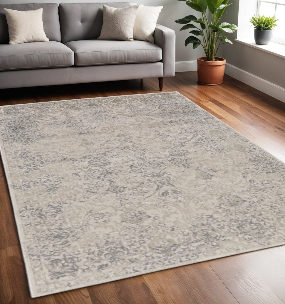 5' X 8' Ivory Gray And Black Abstract Stain Resistant Area Rug