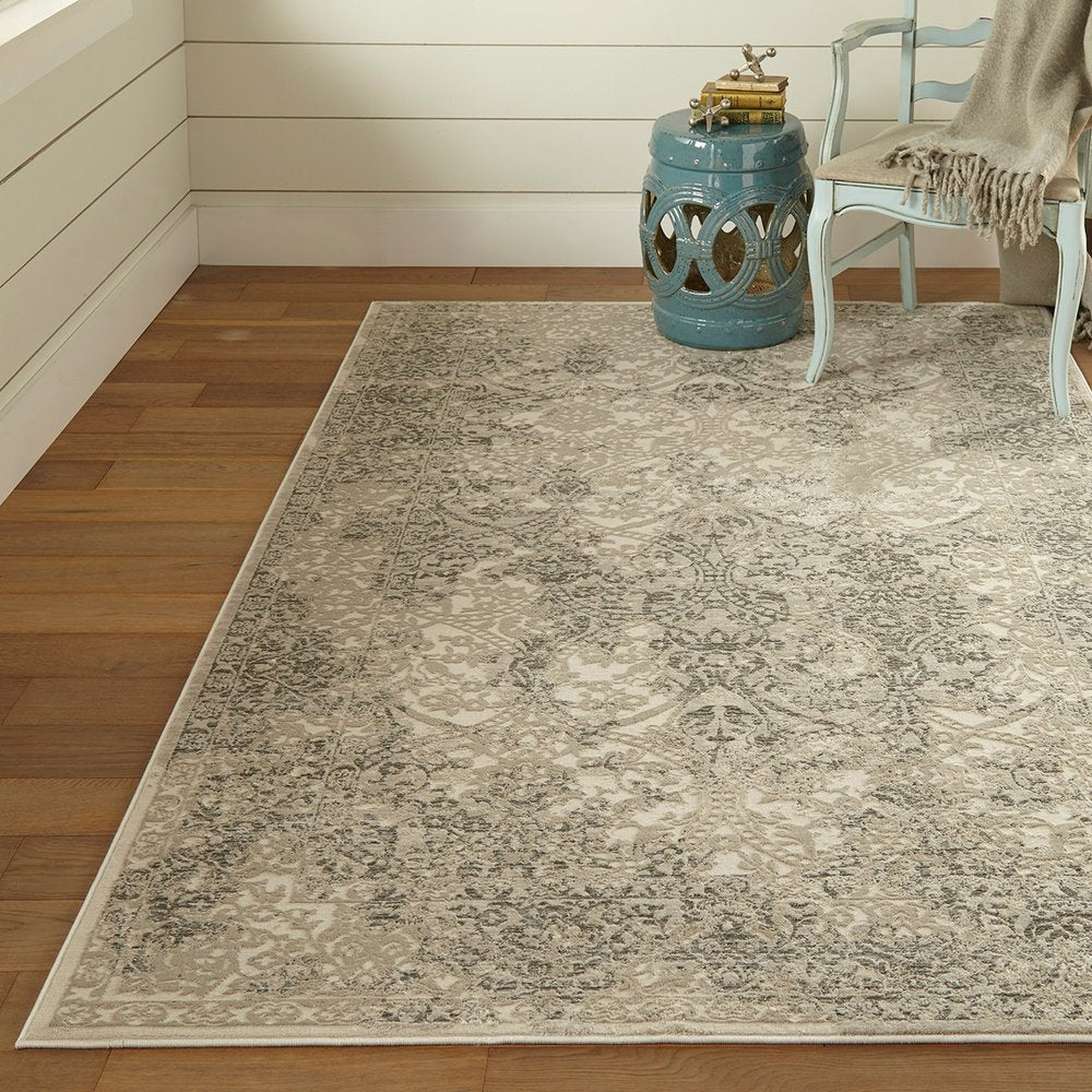 5' X 8' Ivory Gray And Black Abstract Stain Resistant Area Rug
