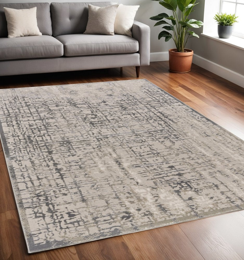 5' X 8' Gray And Ivory Abstract Stain Resistant Area Rug