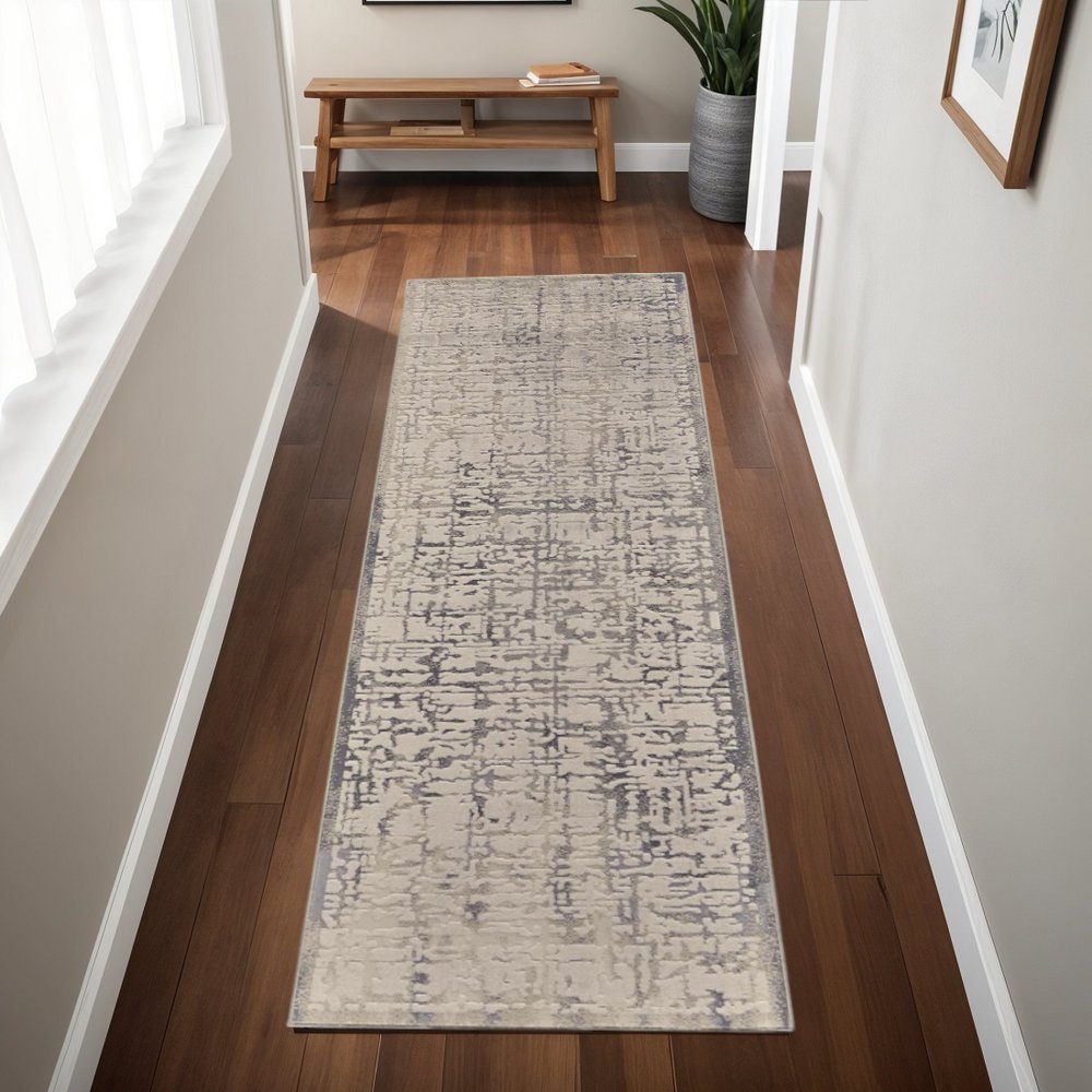 5' X 8' Gray And Ivory Abstract Stain Resistant Area Rug