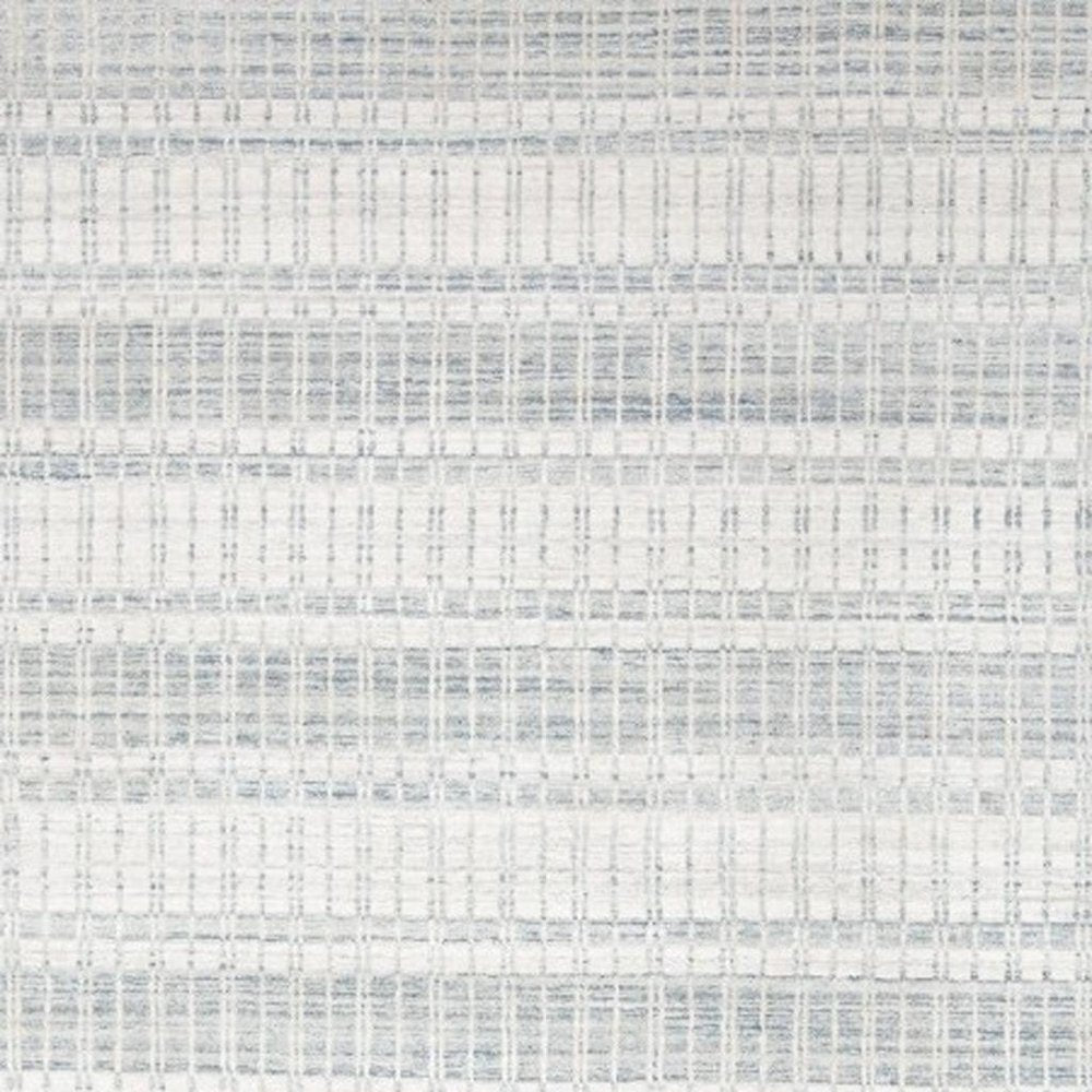 7' X 9' Ivory And Blue Striped Hand Woven Area Rug