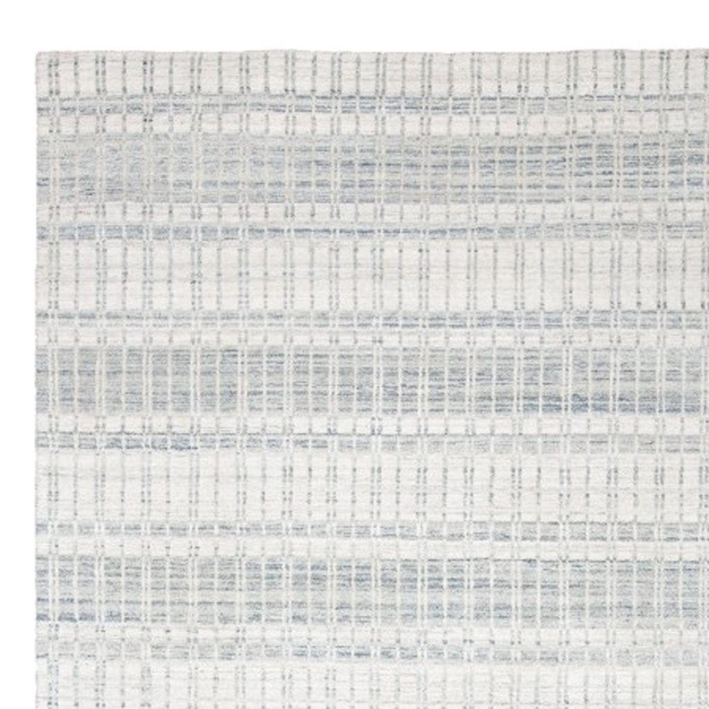 7' X 9' Ivory And Blue Striped Hand Woven Area Rug