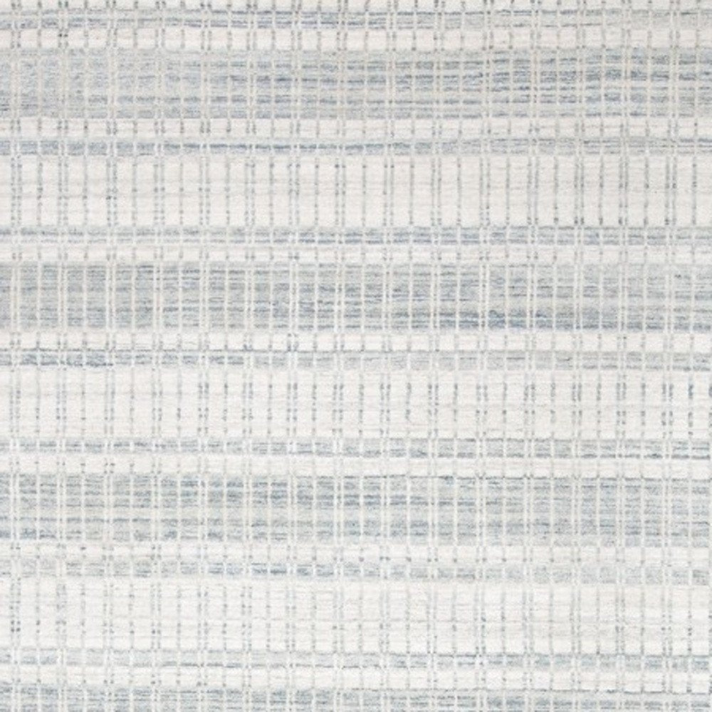 7' X 9' Ivory And Blue Striped Hand Woven Area Rug