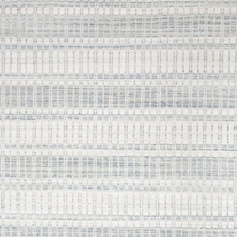 7' X 9' Ivory And Blue Striped Hand Woven Area Rug