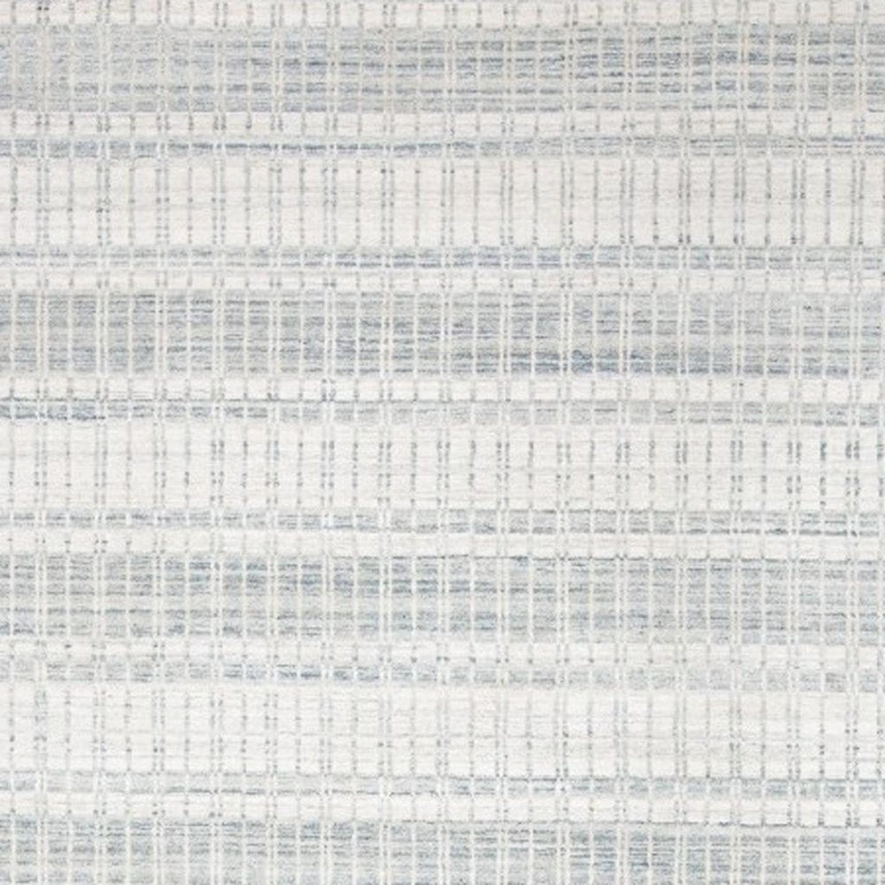 7' X 9' Ivory And Blue Striped Hand Woven Area Rug