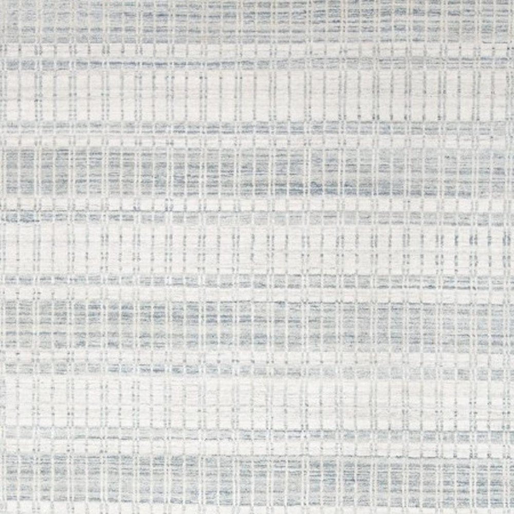 7' X 9' Ivory And Blue Striped Hand Woven Area Rug