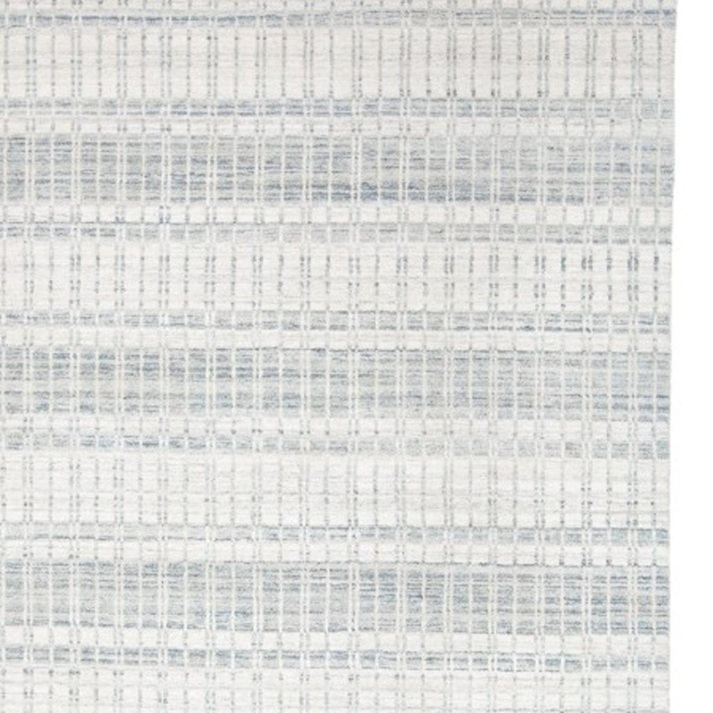 7' X 9' Ivory And Blue Striped Hand Woven Area Rug