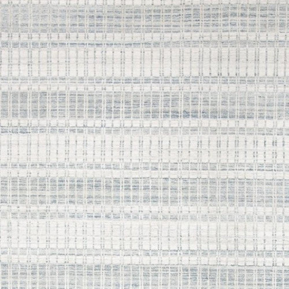 7' X 9' Ivory And Blue Striped Hand Woven Area Rug