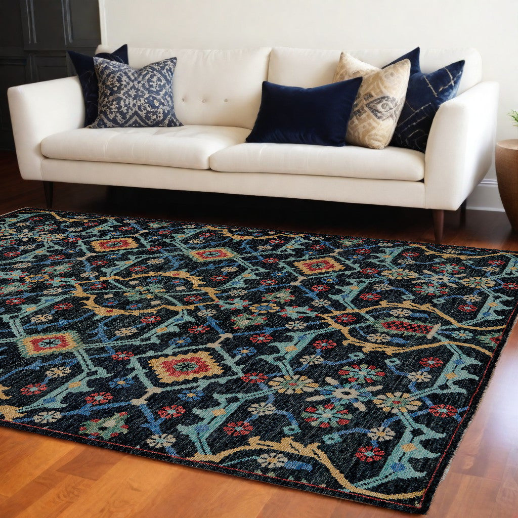 4' X 6' Black Blue and Orange Wool Tribal Hand Knotted Distressed Area Rug With Fringe