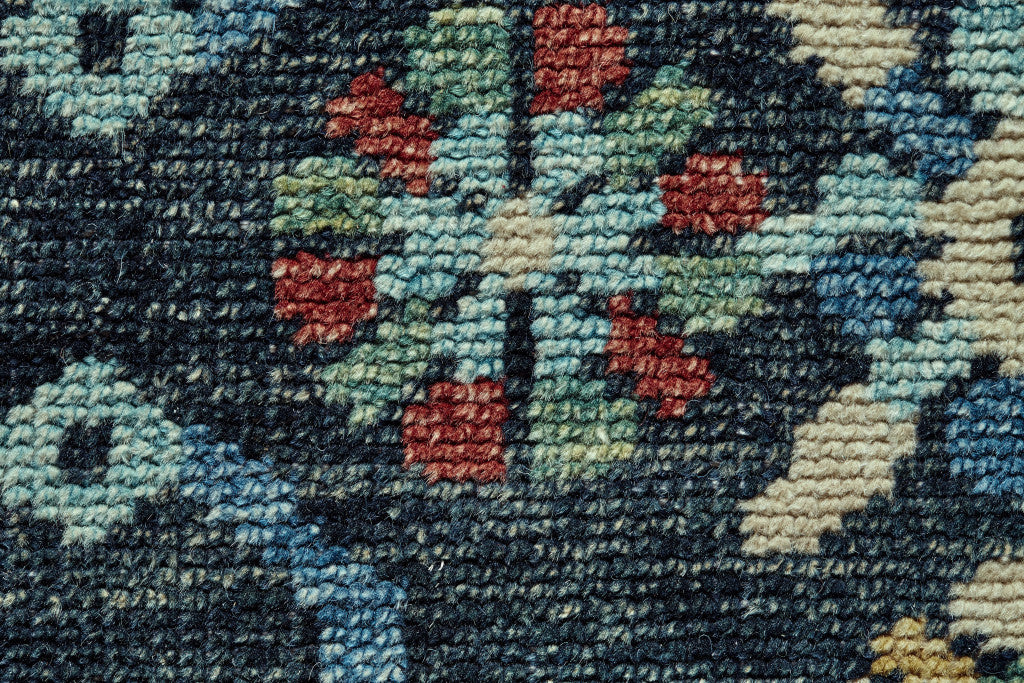 4' X 6' Black Blue and Orange Wool Tribal Hand Knotted Distressed Area Rug With Fringe