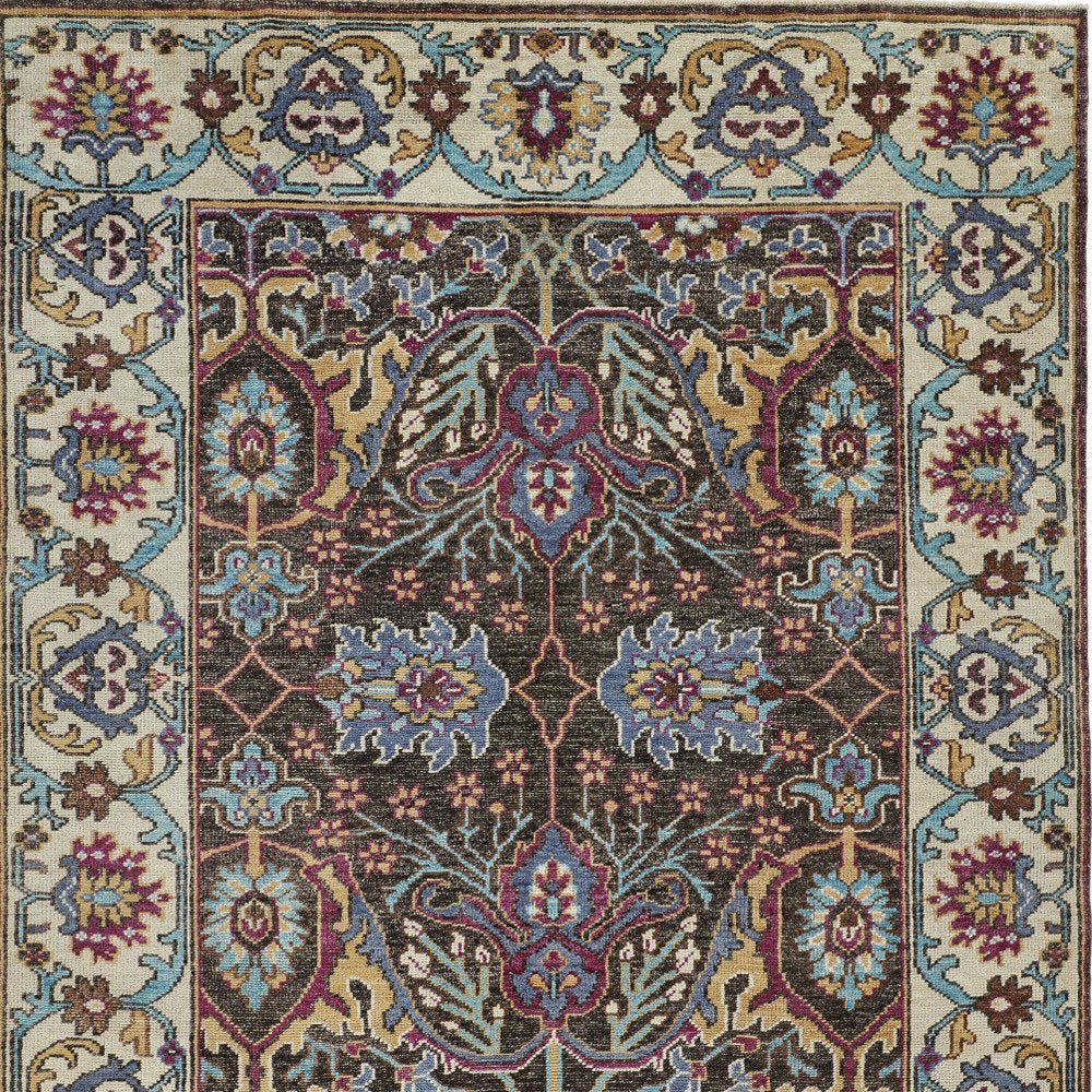 2' X 3' Ivory and Blue Wool Floral Hand Knotted Distressed Area Rug With Fringe