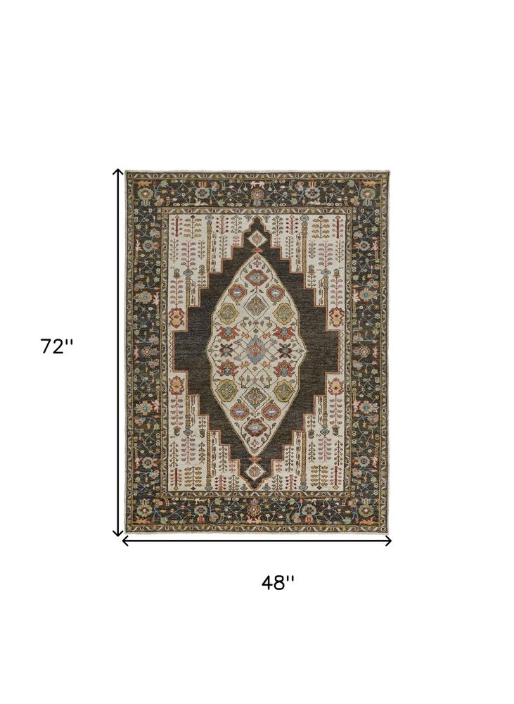 8' Green and Ivory Wool Floral Hand Knotted Distressed Runner Rug With Fringe