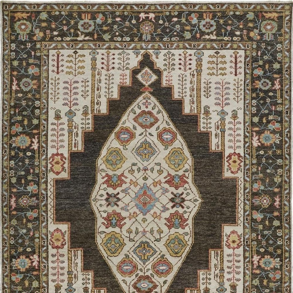 8' Green and Ivory Wool Floral Hand Knotted Distressed Runner Rug With Fringe