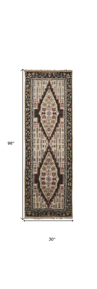8' Green and Ivory Wool Floral Hand Knotted Distressed Runner Rug With Fringe