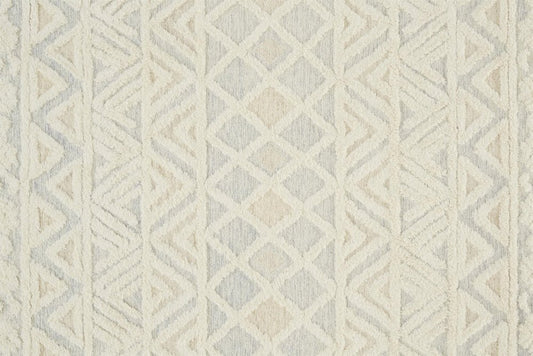 5' X 8' Ivory Blue And Tan Wool Geometric Tufted Handmade Stain Resistant Area Rug