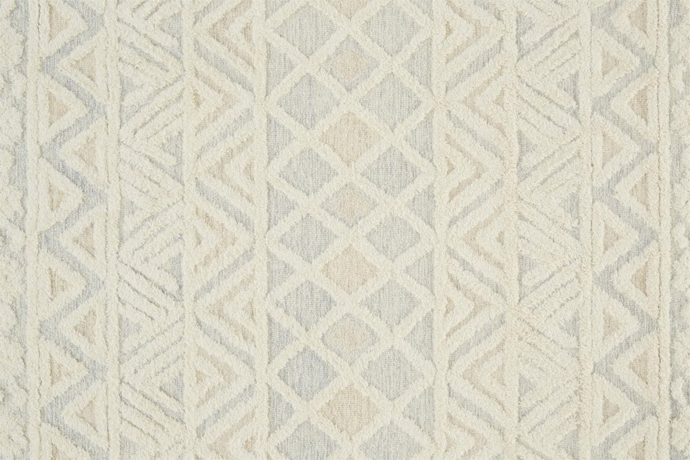 5' X 8' Ivory Blue And Tan Wool Geometric Tufted Handmade Stain Resistant Area Rug
