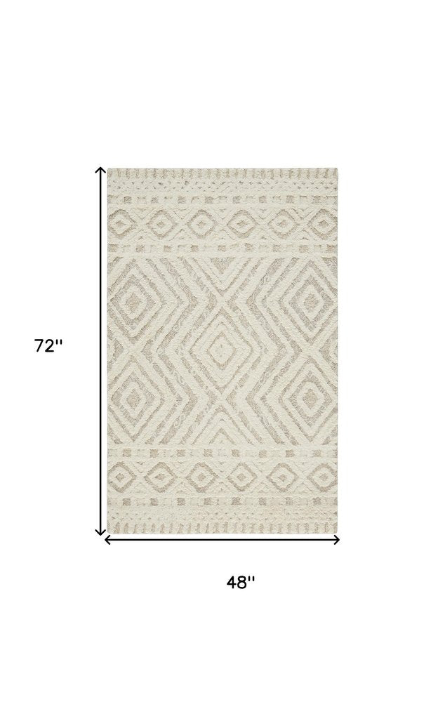 4' X 6' Ivory And Tan Wool Geometric Tufted Handmade Stain Resistant Area Rug