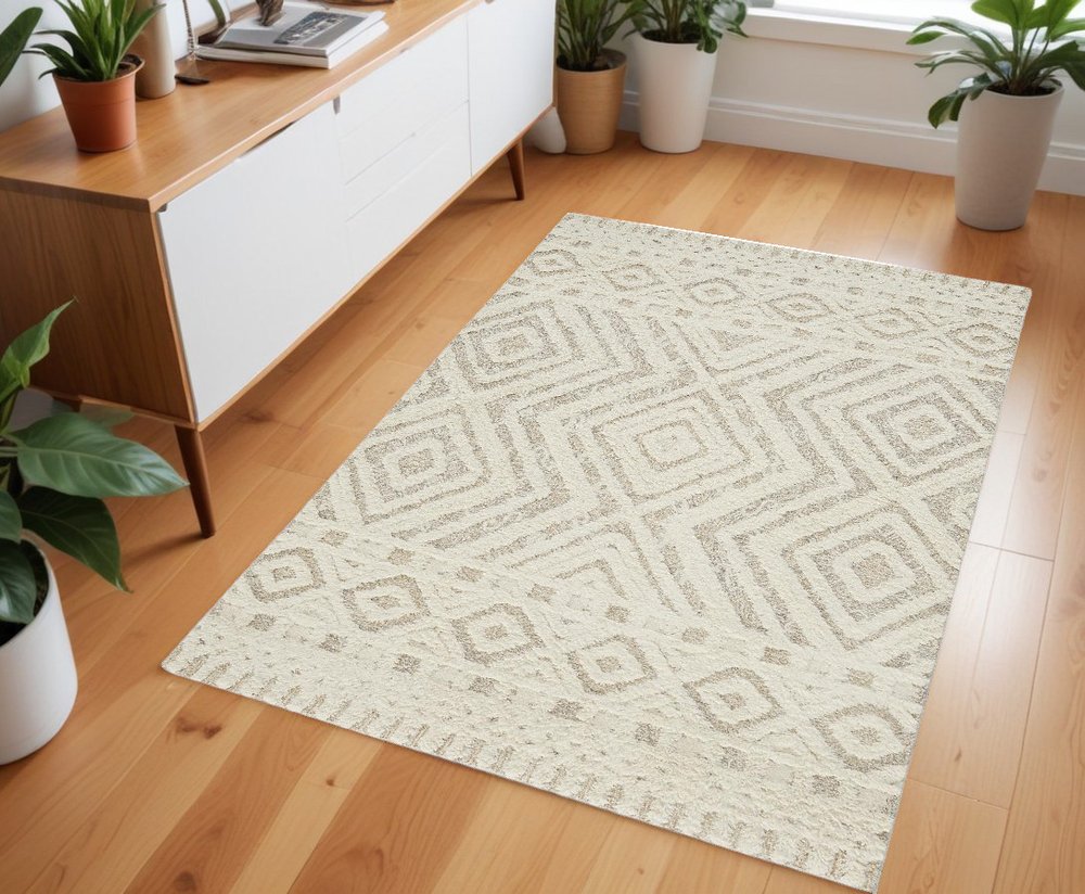 4' X 6' Ivory And Tan Wool Geometric Tufted Handmade Stain Resistant Area Rug