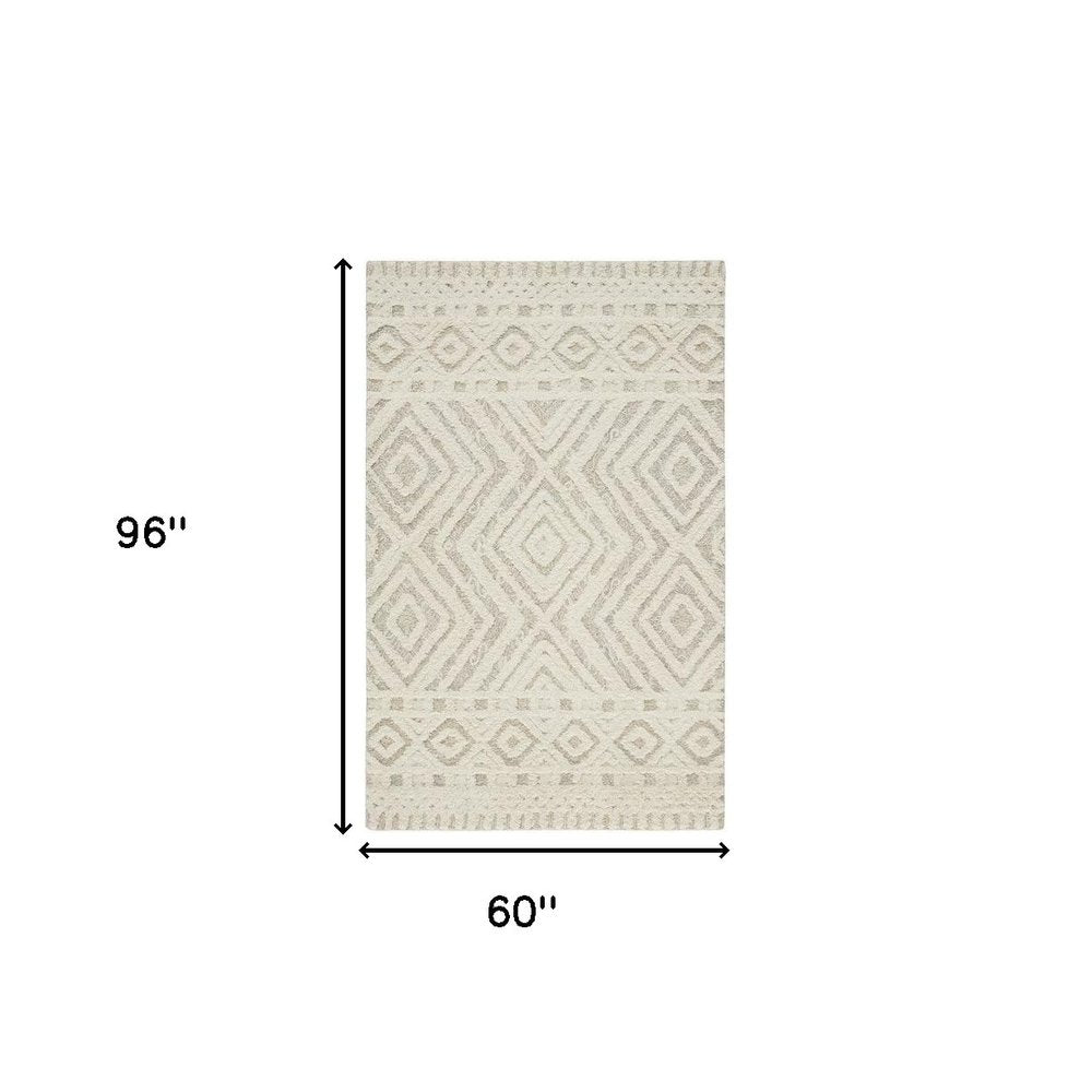 4' X 6' Ivory And Tan Wool Geometric Tufted Handmade Stain Resistant Area Rug