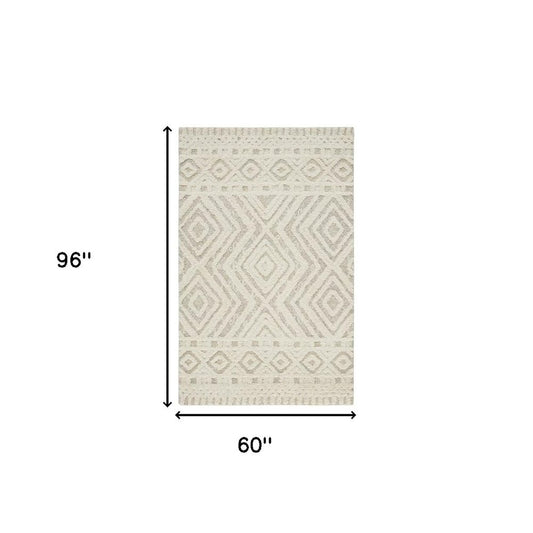 4' X 6' Ivory And Tan Wool Geometric Tufted Handmade Stain Resistant Area Rug